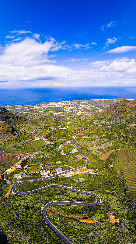 鸟瞰西班牙特内里费岛乡村公园的El Palmar、Beunavista del Norte和Los Silos蜿蜒的道路